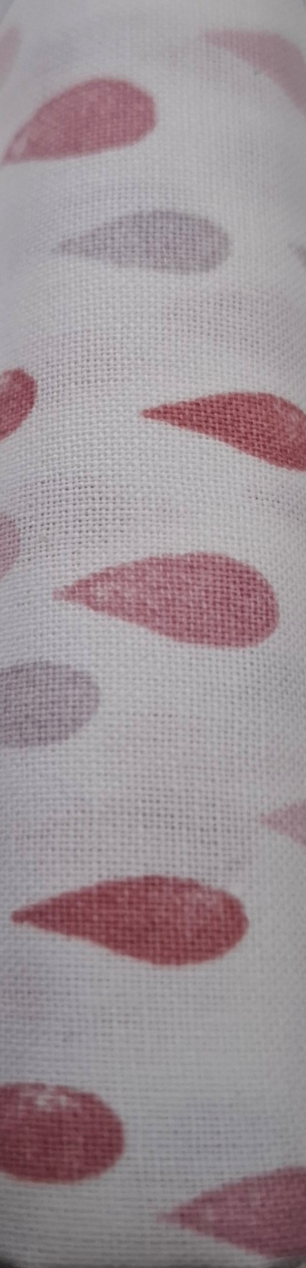 Tessuto bianco gocce rosa